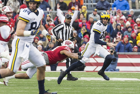 Sean McKeon (84) and Brandon Peters (18)