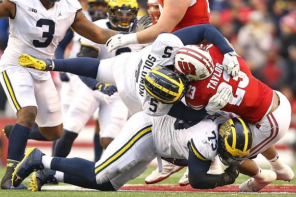 Rashan Gary (3), Aubrey Solomon (5), and Maurice Hurst (73)