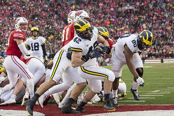 Brandon Peters (18), Ben Mason (42), and Khalid Hill (80)