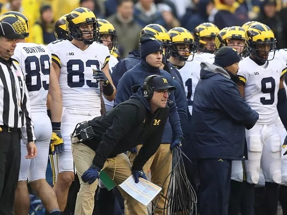 Ian Bunting (89), Zach Gentry (83), Jim Harbaugh, and Donovan Peoples-Jones (9)