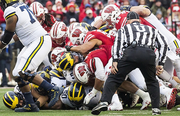 Juwann Bushell-Beatty (76), Nick Eubanks (82), Michael Onwenu (50), and Jon Runyan Jr. (75)