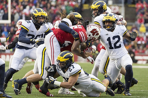 J'Marick Woods (26), Jordan Glasgow (29), Joe Hewlett (27), and Josh Ross (12)