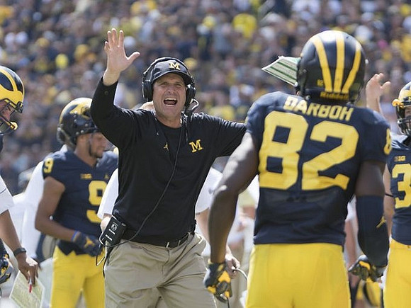 Jim Harbaugh and Amara Darboh (82)