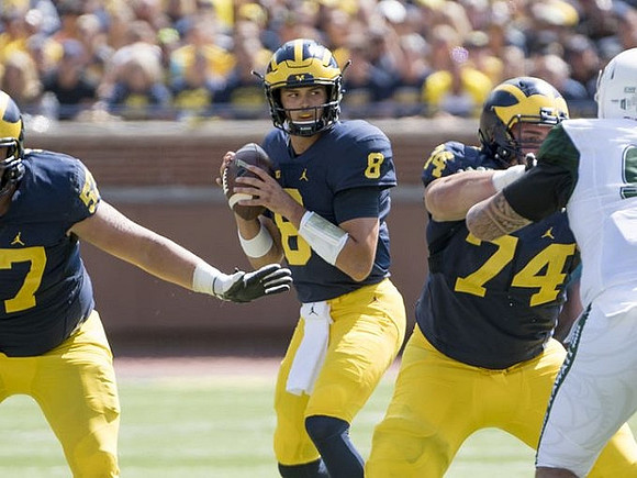 Patrick Kugler (57), John O'Korn (8), and Ben Bredeson (74)