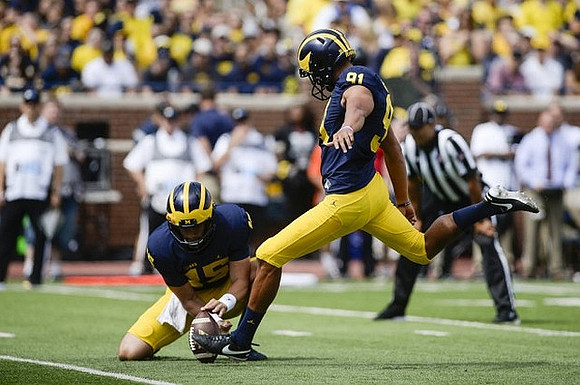 Garrett Moores (15) and Kenny Allen (91)