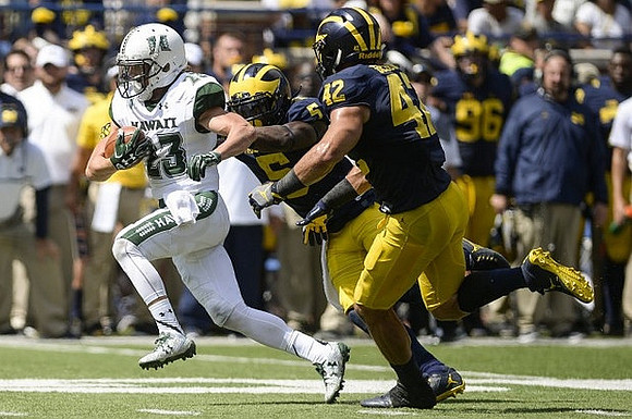 Jabrill Peppers (5) and Ben Gedeon (42)