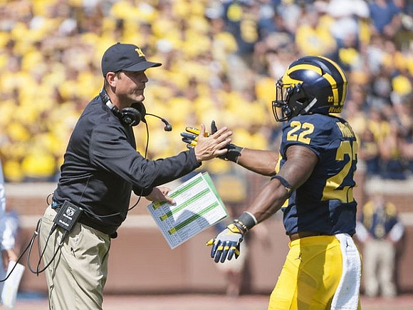 Jim Harbaugh and Karan Higdon (22)