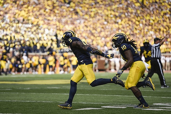 Jabrill Peppers (5), Devin Bush (10), and Delano Hill (44)