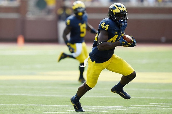 Delano Hill (44) and Jabrill Peppers (5)