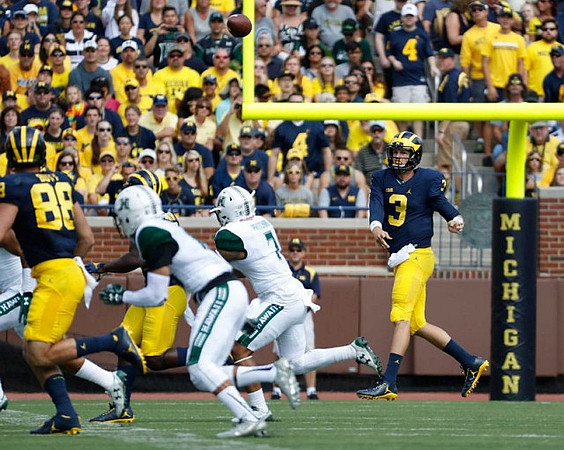 Jake Butt (88) and Wilton Speight (3)
