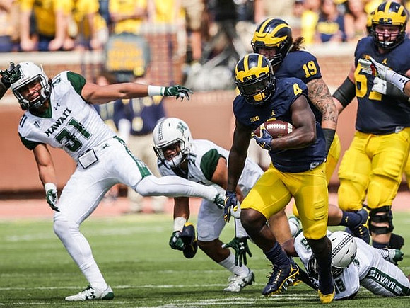 De'Veon Smith (4), Henry Poggi (19), and Kyle Kalis (67)