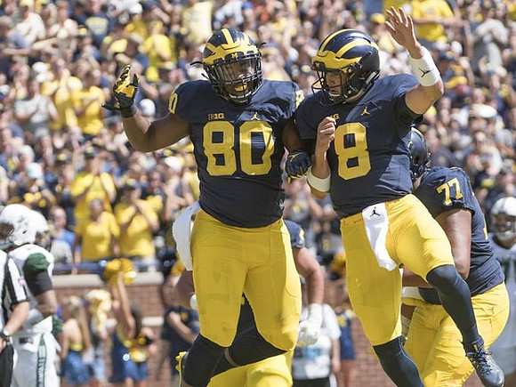 Khalid Hill (80), John O'Korn (8), and Grant Newsome (77)