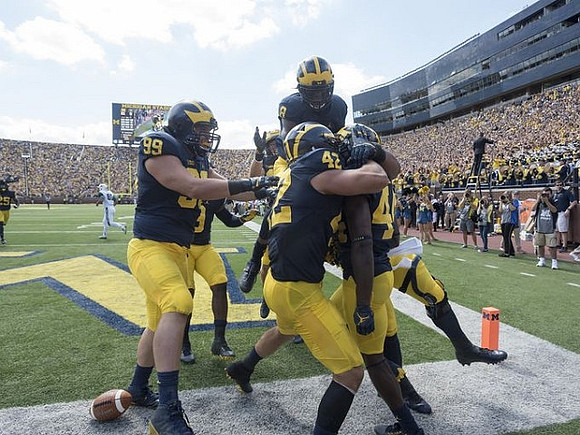 Matthew Godin (99), Ben Gedeon (42), Delano Hill (44), and Channing Stribling (8)