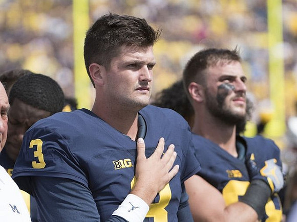 Wilton Speight (3) and Jake Butt (88)
