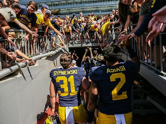 Scott Sypniewski (31) and Devin Asiasi (2)