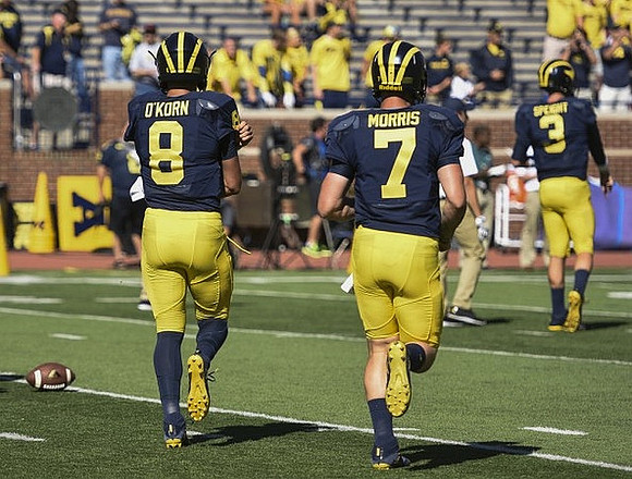 John O'Korn (8), Shane Morris (7), and Wilton Speight (3)