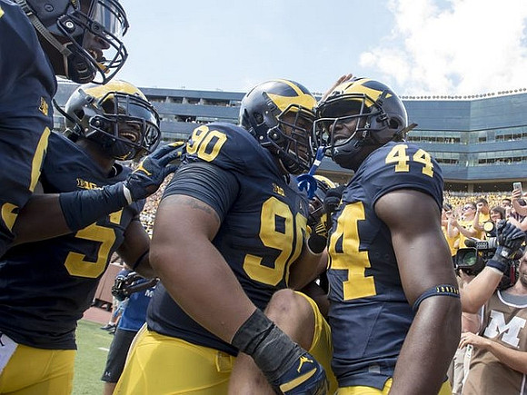 Jabrill Peppers (5), Bryan Mone (90), and Delano Hill (44)