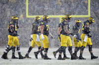 Kyle Kalis (67), Tyrone Wheatley Jr. (17), Ben Bredeson (74), Ben Braden (71), De'Veon Smith (4), and Mason Cole (52)