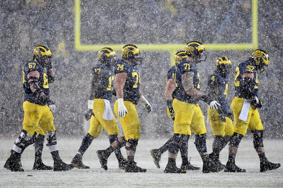 Kyle Kalis (67), Tyrone Wheatley Jr. (17), Ben Bredeson (74), Ben Braden (71), De'Veon Smith (4), and Mason Cole (52)