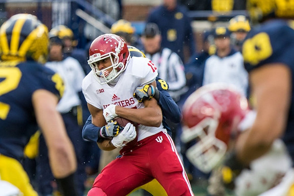 Ben Gedeon (42), Channing Stribling (8), and Chris Wormley (43)