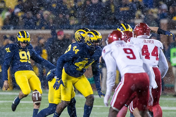 Kenny Allen (91) and Delano Hill (44)