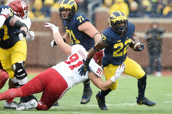 Kyle Kalis (67), Ben Braden (71), and Karan Higdon (22)