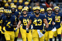 De'Veon Smith (4), Michael Jocz (81), Chris Wormley (43), Shane Morris (7), and Michigan Team