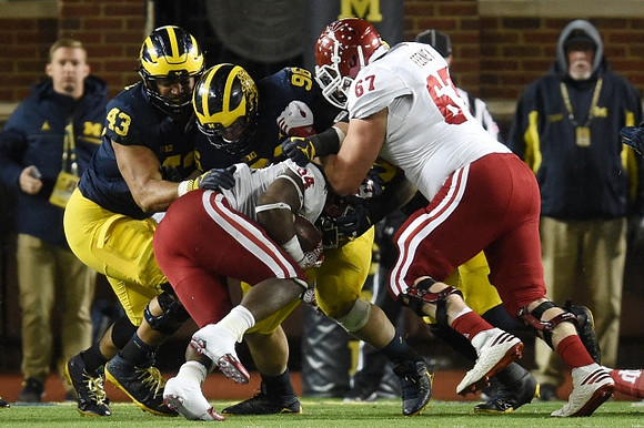 Chris Wormley (43) and Ryan Glasgow (96)