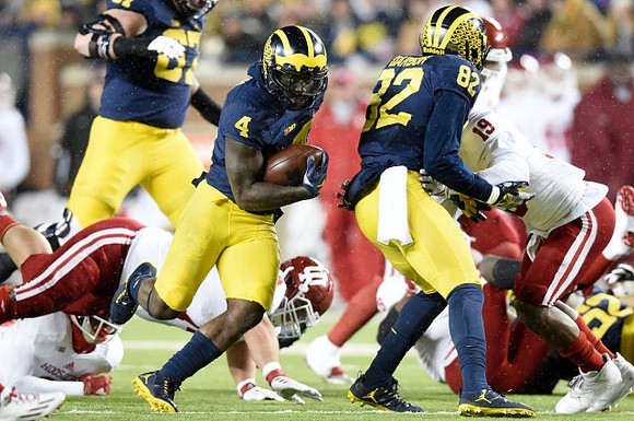 Kyle Kalis (67), De'Veon Smith (4), Amara Darboh (82), and Mason Cole (52)