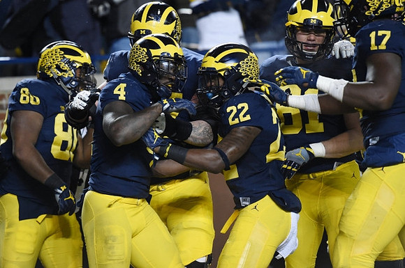 Khalid Hill (80), De'Veon Smith (4), Karan Higdon (22), Michael Jocz (81), and Tyrone Wheatley Jr. (17)