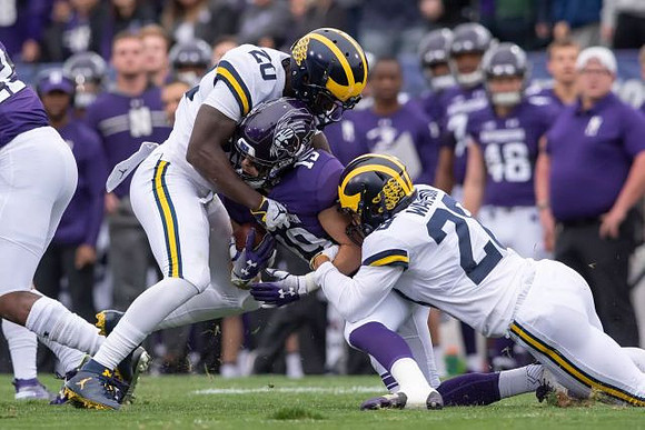 Brad Hawkins (20) and Brandon Watson (28)