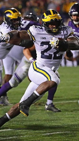 Juwann Bushell-Beatty (76) and Karan Higdon (22)