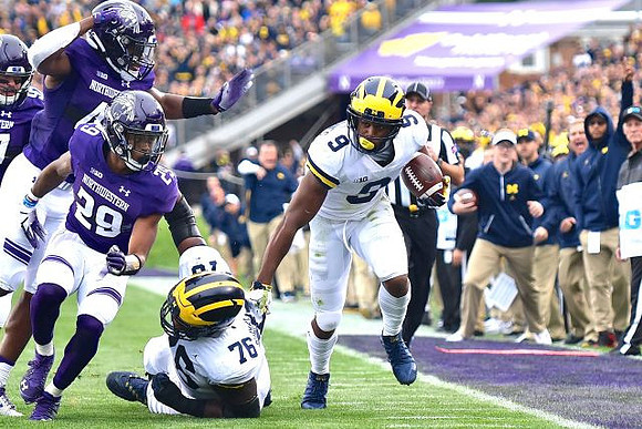 Juwann Bushell-Beatty (76) and Donovan Peoples-Jones (9)