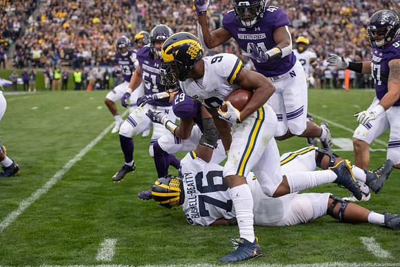 Donovan Peoples-Jones (9) and Juwann Bushell-Beatty (76)