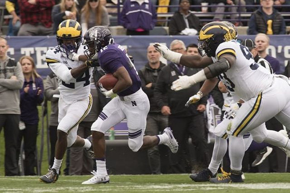 Lavert Hill (24) and Lawrence Marshall (93)