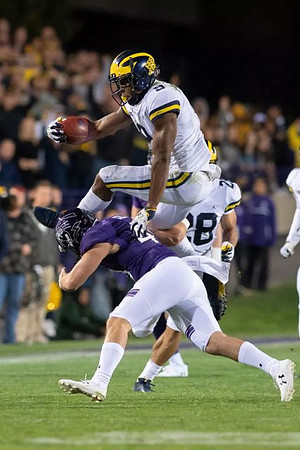 Brandon Watson (28) and Donovan Peoples-Jones (9)