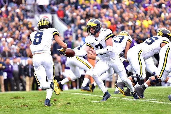 Ronnie Bell (8), Shea Patterson (2), Ben Bredeson (74), Zach Gentry (83), and Jon Runyan Jr. (75)