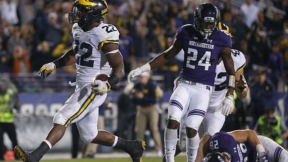 Karan Higdon (22) and Ben Mason (42)