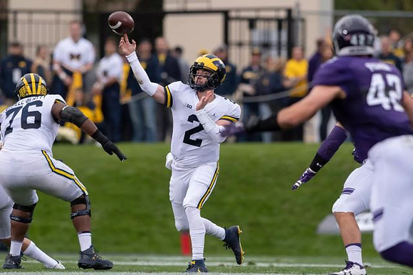 Juwann Bushell-Beatty (76) and Shea Patterson (2)