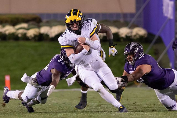 Ben Mason (42) and Karan Higdon (22)
