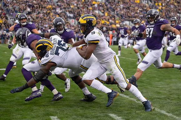 Juwann Bushell-Beatty (76) and Donovan Peoples-Jones (9)
