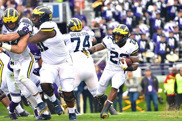 Sean McKeon (84), Cesar Ruiz (51), Ben Bredeson (74), and Karan Higdon (22)