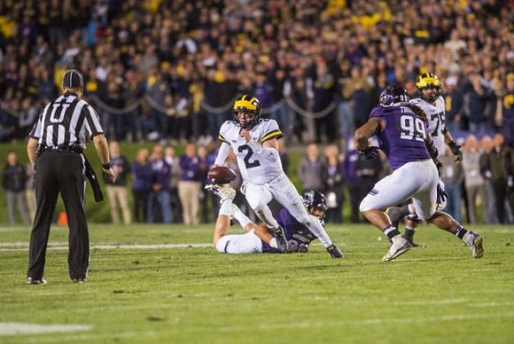 Shea Patterson (2) and Jon Runyan Jr. (75)