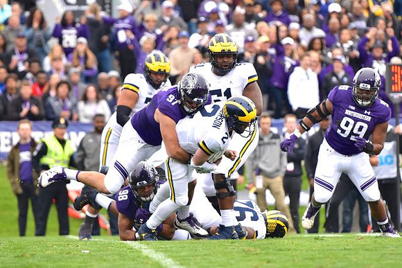 Tarik Black (7), Shea Patterson (2), Cesar Ruiz (51), and Juwann Bushell-Beatty (76)