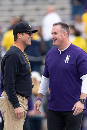 Jim Harbaugh and Northwestern Head Coach Pat Fitzgerald