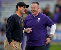 Jim Harbaugh and Northwestern Head Coach Pat Fitzgerald