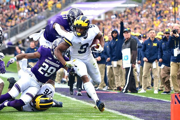 Juwann Bushell-Beatty (76) and Donovan Peoples-Jones (9)