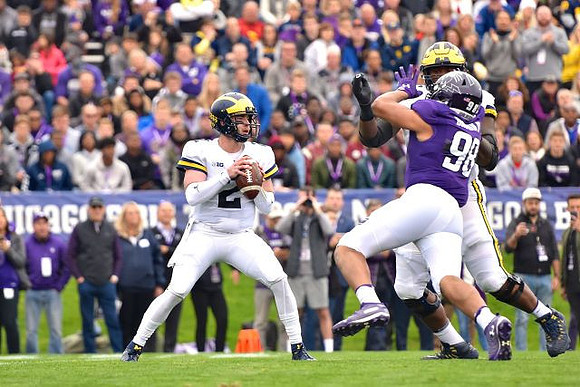 Shea Patterson (2) and Juwann Bushell-Beatty (76)