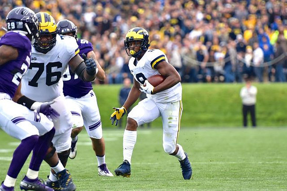 Juwann Bushell-Beatty (76) and Donovan Peoples-Jones (9)