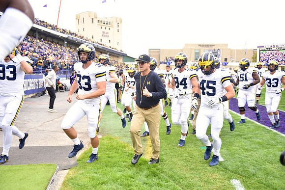 Jim Harbaugh and Michigan Team